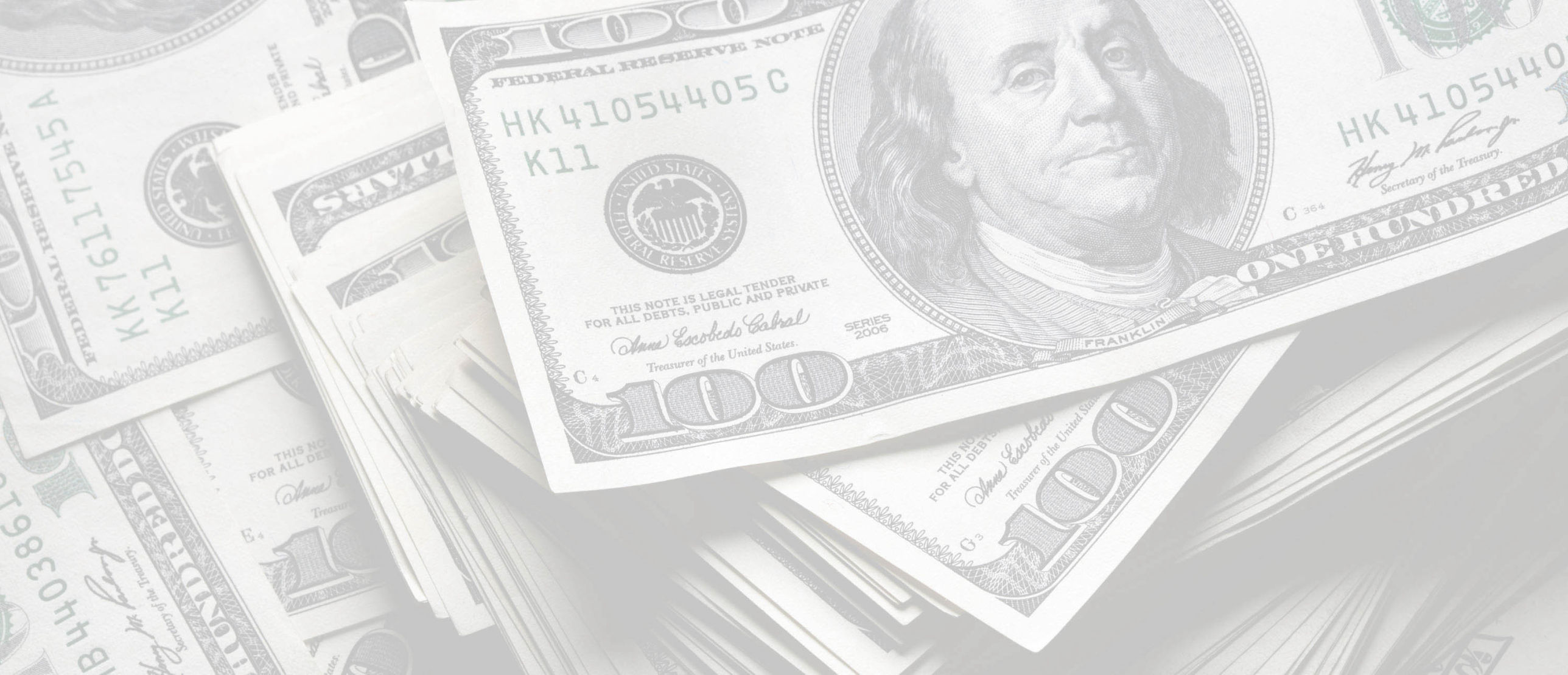 Photo of Stack of $100 bills